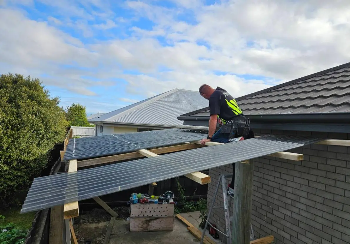 Man working on clear roofing